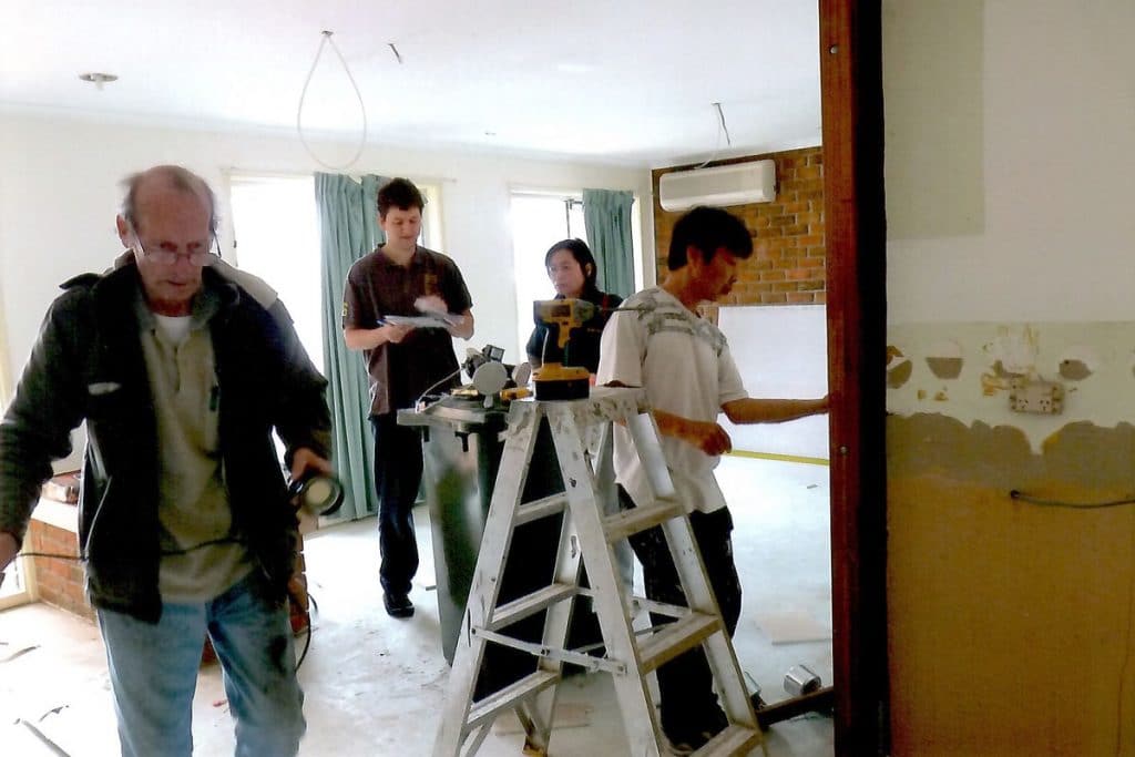 Friends and family all putting their hands together to help out.