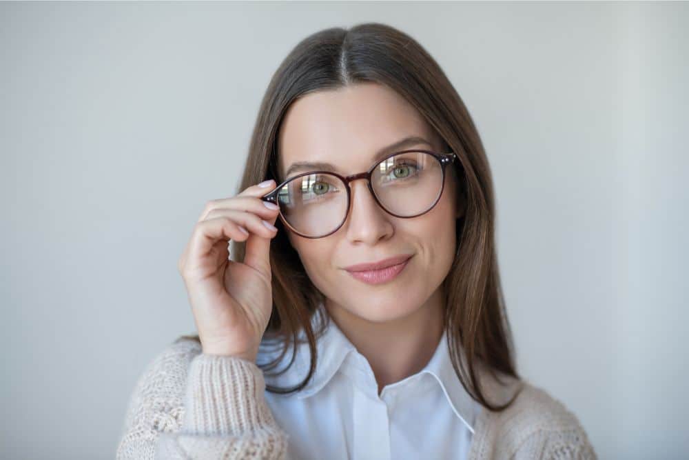 A woman wearing premium lenses eyeglasses.