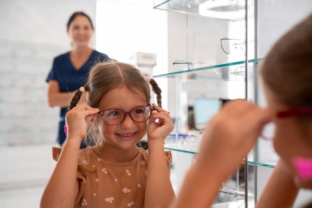A young girl wearing myopia glasses for clear vision