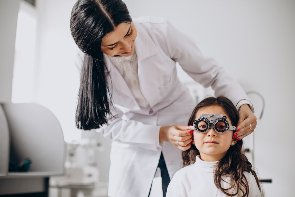 little girl checking her eyesight