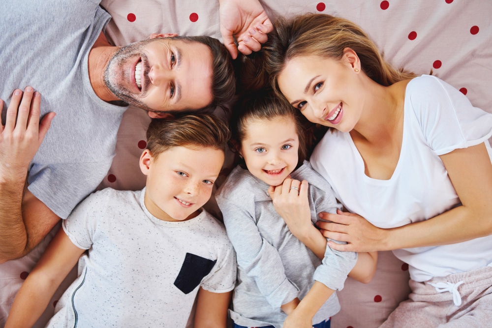 happy family on bed - OrthoK